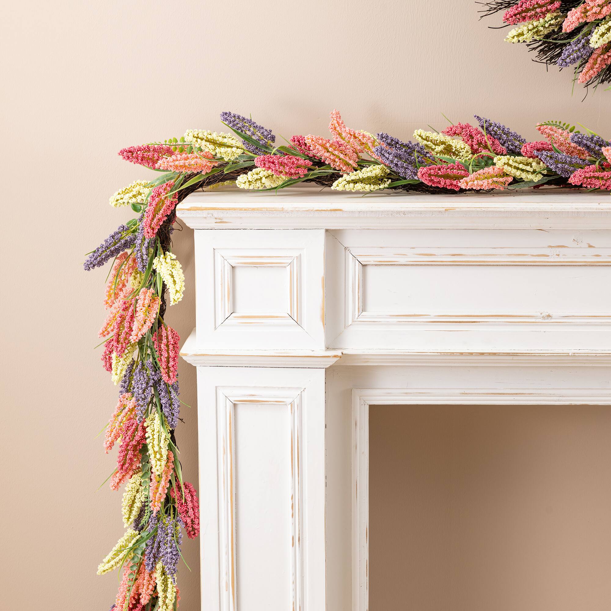 Glitzhome® 6ft. Pink, Purple & Yellow Mixed Heather Garland